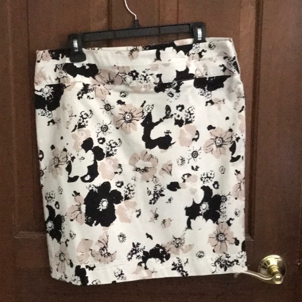 White floral mid thigh length summer skirt.